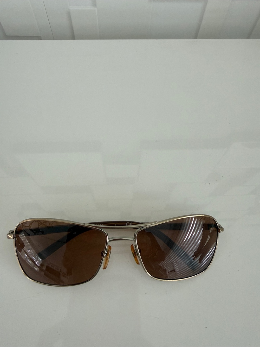 Anne Klein Silver Frame Brown Lens Women’s Aviator Sunglasses